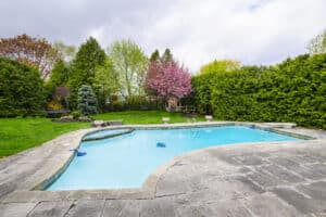 pool renovation project with stone decking