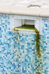 damaged pool tiles requiring repair